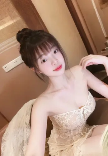 Portrait of a young woman with long dark hair in a video-chat style frame
